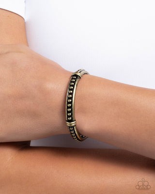 Studded Surprise - Brass