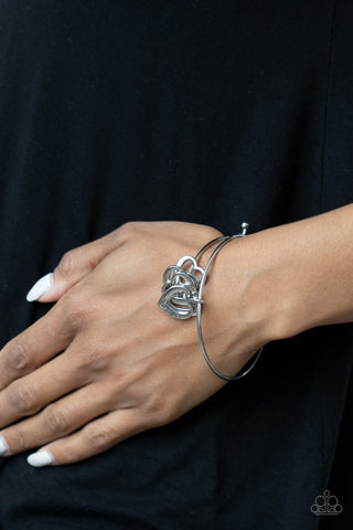 A Charmed Society Silver Paparazzi Bracelet